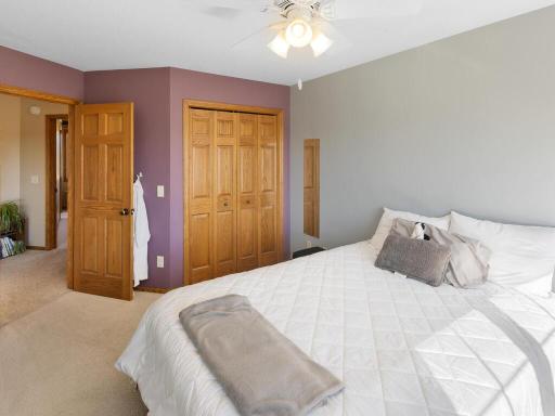 Bedroom 2 with ceiling light/fan, large closet
