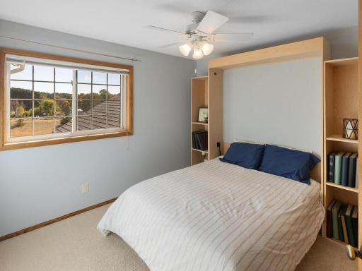 Bedroom 3, ceiling fan/light, large closet; Murphy Bed does not stay with home