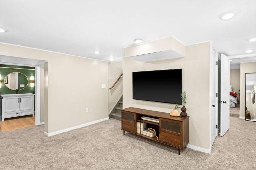 Lower level also features a 3/4 bath, 3rd bedroom, and laundry room