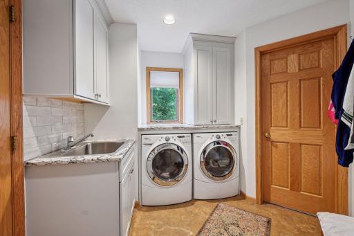 Updated laundry room with new washer and dryer