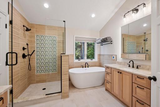 Freshly updated master bath, heated floors, his/her sinks