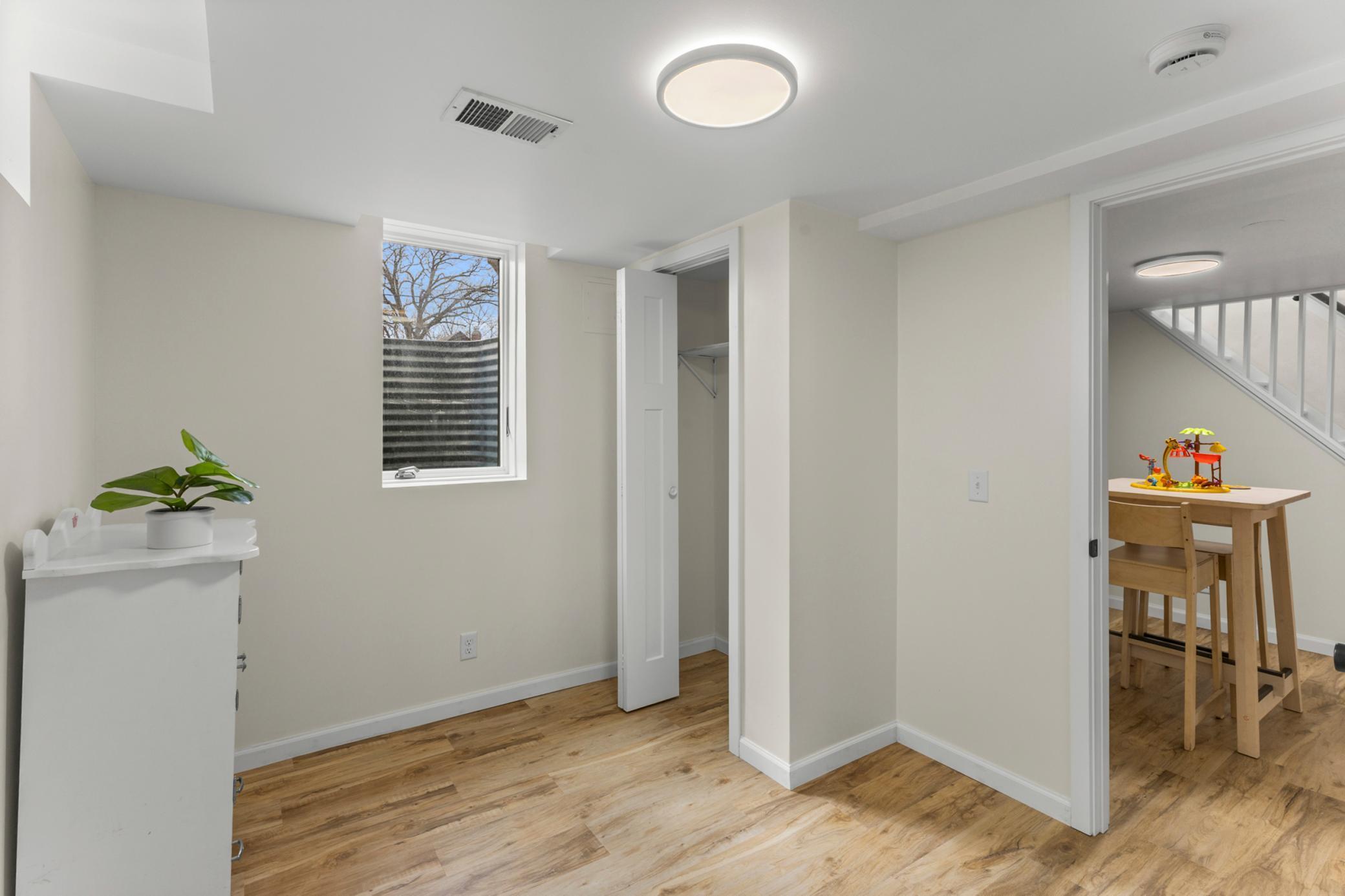 Lower level bedroom w/egress window.