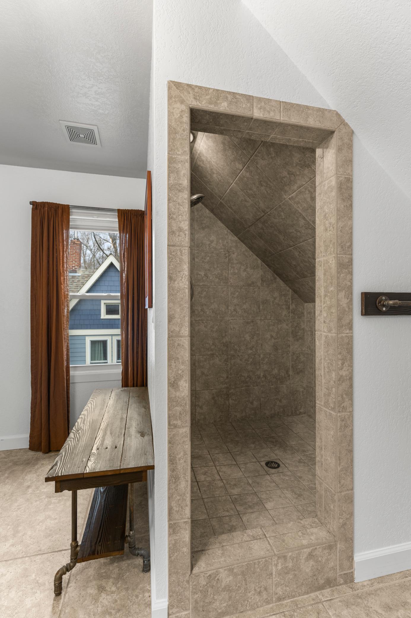 Walk in primary shower.