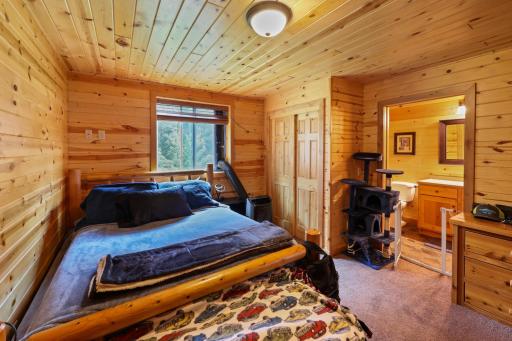 Main Floor Primary Bedroom with large closet and walk through bathroom