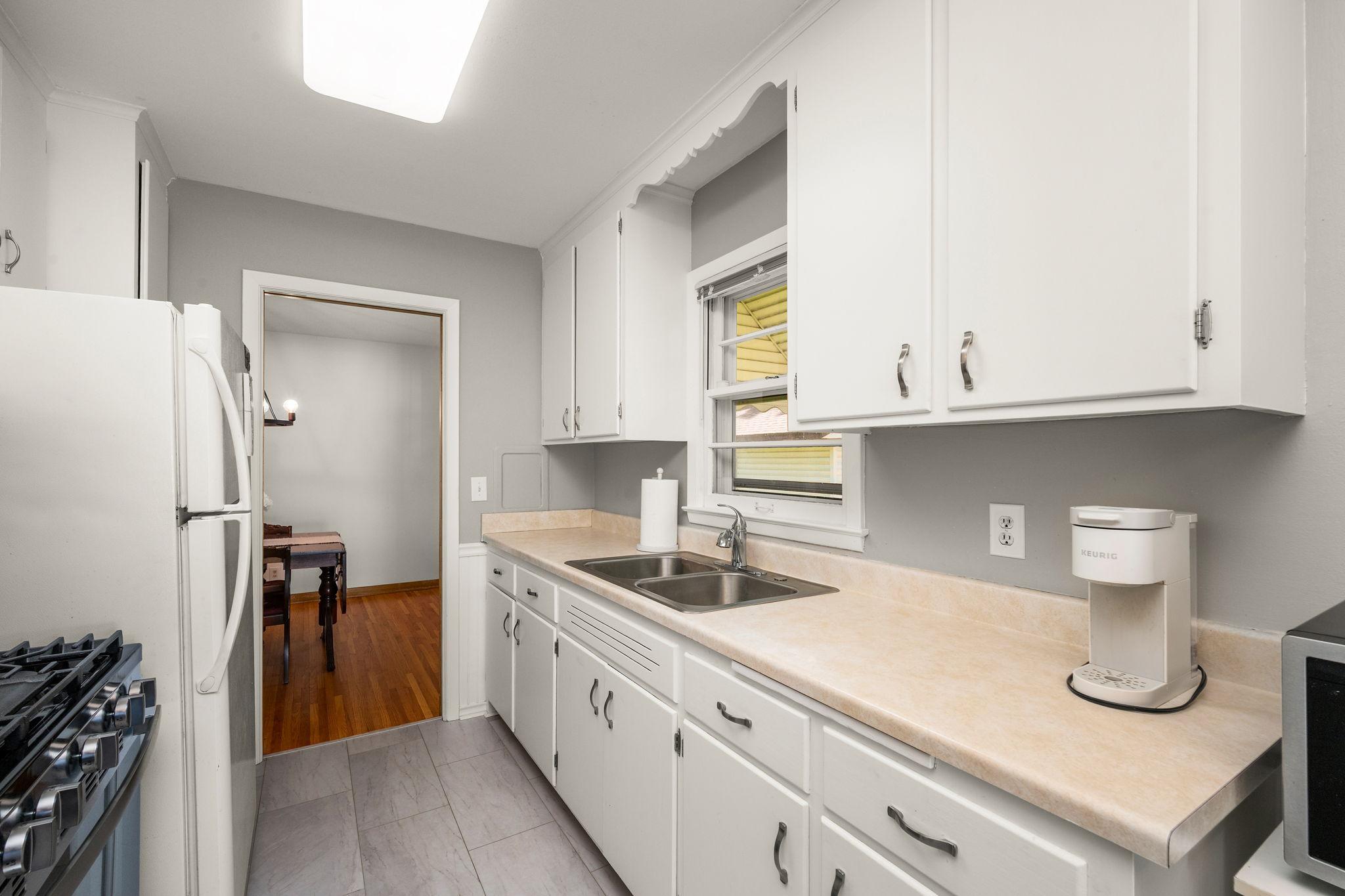 Updated kitchen with new LVP flooring and a gas range!