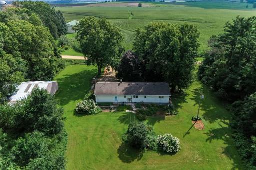 Aerial view of the Home, 2.5+ acre setting, and 40x40 Outbuilding.