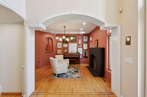 Elegant formal dining room featuring a stylish decorative gas fireplace
