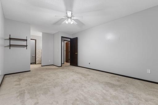 The primary bedroom also features its own private bathroom for your convenience.