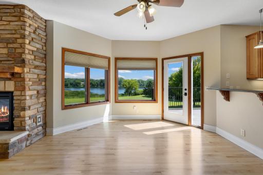 Serene pond views framed by oversized windows.