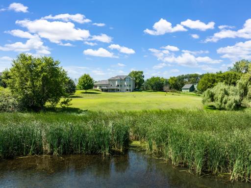 Enjoy morning coffee with peaceful lakefront views.