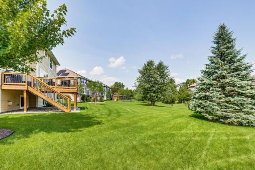 Spacious and palatial rear yard space - open and prepared for entertainment.