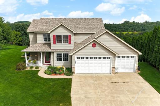 Aerial view of the property — a stunning .66-acre lot in town, backing to the Sand Coulee preserve.