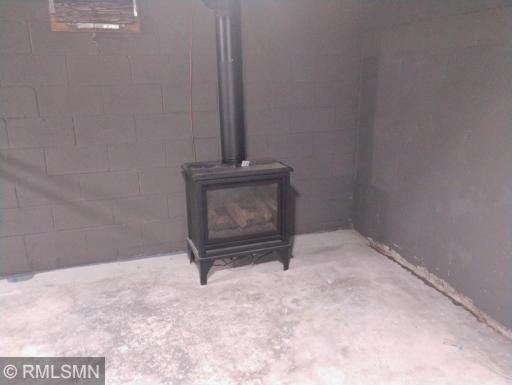Gas parlor stove for separate heat in exercise/work room source in bonus room