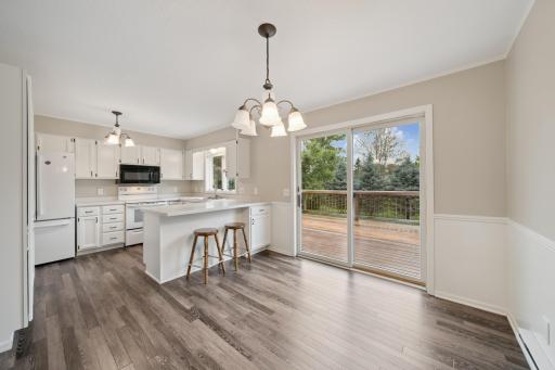 Large eat in kitchen with a walkout to the deck
