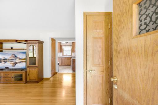 Beautifully finished hardwood floors span the main level which boasts 3 bedrooms, a full bathroom, and a spacious and bright living room.