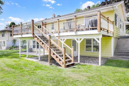 The large, low-maintenance deck, located just off the dining room, offers the perfect place for entertaining guests and for catching morning sunshine.