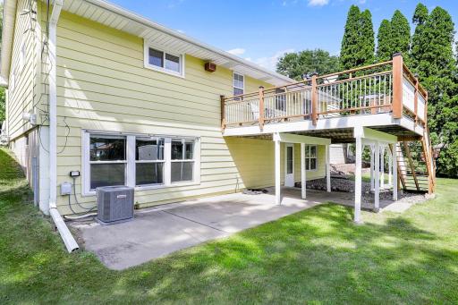 The large, low-maintenance deck, located just off the dining room, offers the perfect place for entertaining guests and for catching morning sunshine.