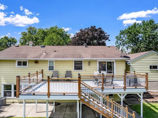 The large, low-maintenance deck, located just off the dining room, offers the perfect place for entertaining guests and for catching morning sunshine.