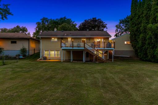 The large, low-maintenance deck, located just off the dining room, offers the perfect place for entertaining guests and for catching morning sunshine.