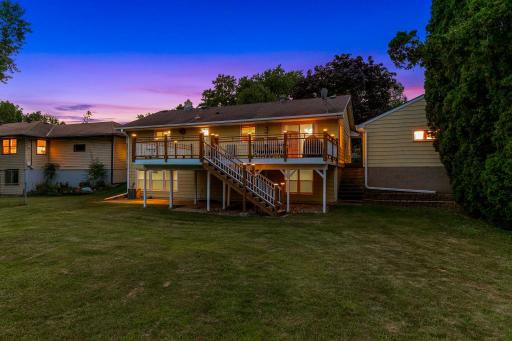The large, low-maintenance deck, located just off the dining room, offers the perfect place for entertaining guests and for catching morning sunshine.