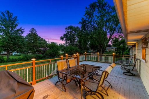 The large, low-maintenance deck, located just off the dining room, offers the perfect place for entertaining guests and for catching morning sunshine.