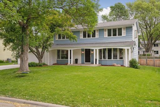 Welcome to 6505 Creek Drive a well-maintained colonial home in a prime West Edina location, directly across from the scenic Nine Mile Creek Regional Trail.