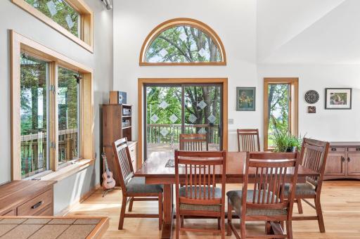 Informal dining area has tons of natural light and walks out to a large deck.