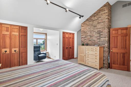 Additional view showing his and her double closets.