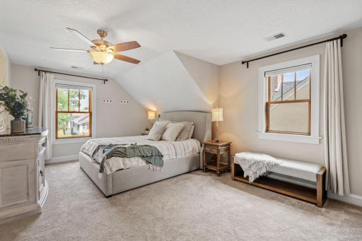 Upper Level Primary Bedroom with abundance of natural light