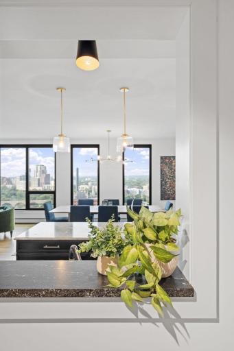 The kitchen interior window which lets natural light in through the hall and interior bedroom.