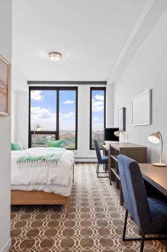 The guest bedroom tucked away with sweeping views toward Saint Paul.