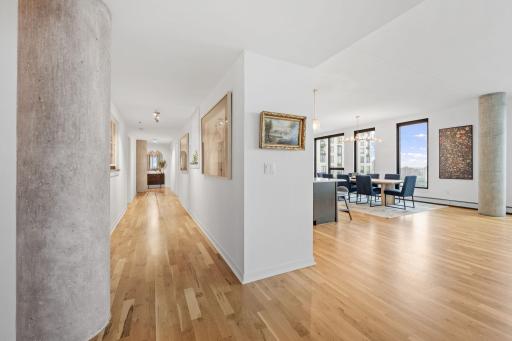 Hallway space gives privacy to the bedrooms and laundry area, making it simple to entertain in this space.