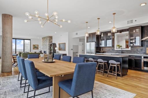 This top floor, corner unit of The Legacy in the Mill District gives sweeping views of the Mississippi River, downtown Minneapolis, and the University of Minnesota.