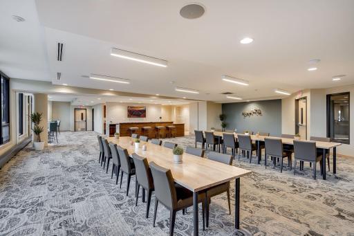Complete with it's own full kitchen, this community room is the perfect place to host a large meeting or a party.