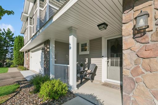Cool and shaded, the front covered porch is a nice place to relax.