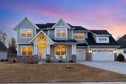 Truly impeccable custom-built masterpiece in the highly sought-after Minnetonka Country Club neighborhood offering the perfect blend of luxury, comfort, and modern design.