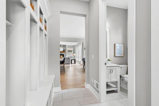 A convenient half bath is located just off the mudroom