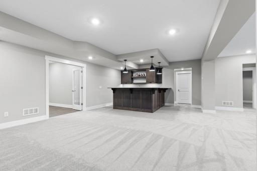 Stylish full bar with seating, ideal for gatherings