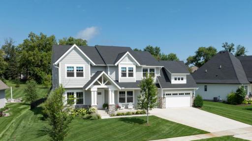 Truly impeccable custom-built masterpiece in the highly sought-after Minnetonka Country Club neighborhood offering the perfect blend of luxury, comfort, and modern design.