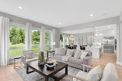 Bright and inviting living spaces with gleaming hardwood floors and abundant natural light