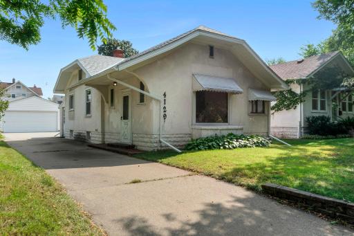 Great location in South Minneapolis just north of Lake Hiawatha and Lake Nokomis! Oversized concrete driveway leads to 2 car garage!