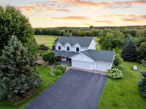 Welcome home to 18 acres of Hobby Farm Bliss!