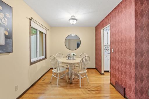 Dining room with open flow to living area.
