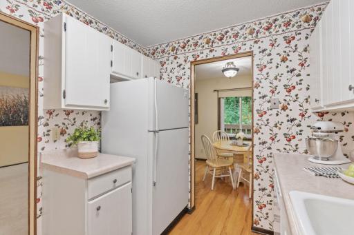 Bright, efficient kitchen with easy access to dining room.
