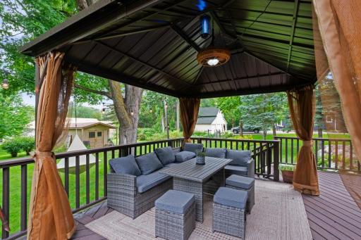 Relax or entertain on the refinished deck with a screened gazebo.