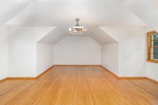 This spacious bedroom is on the upper level.