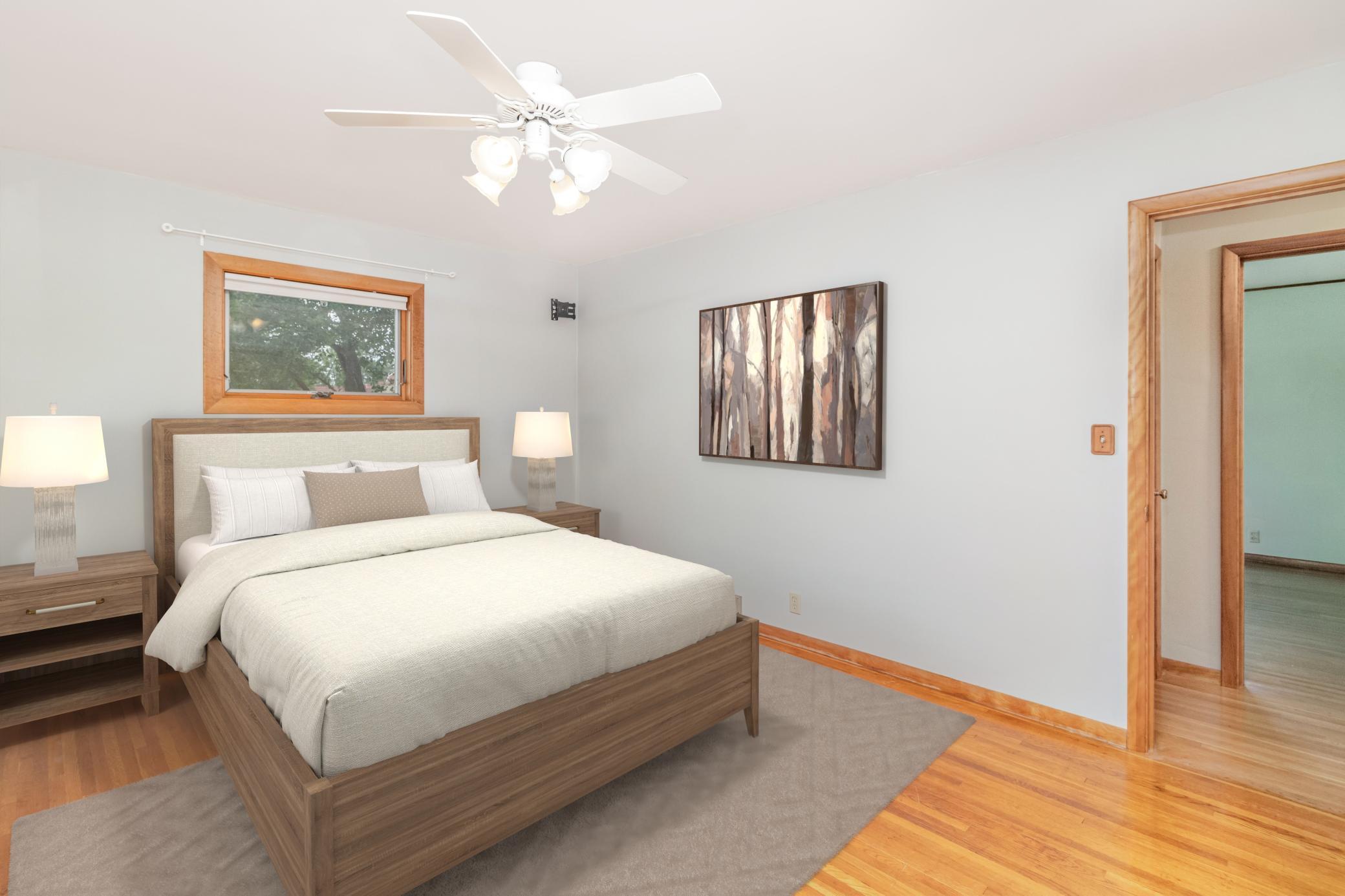 Virtually staged 2nd main floor bedroom.