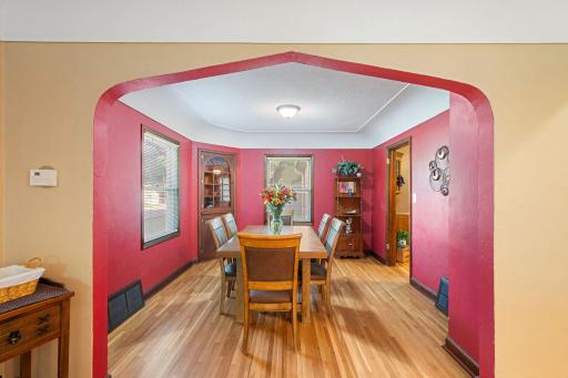 Your formal dining room with gorgeous coved ceilings and arches!