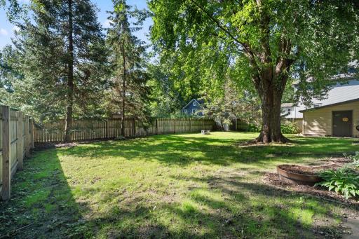 Roomy and fenced in backyard. Notice your shed in the back corner!