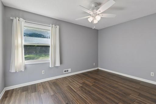 Three comfortable bedrooms are located on the main level, providing convenience and flexibility for a variety of living arrangements